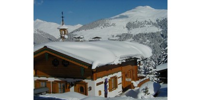 Allergiker-Hotels - Österreich - Haus mit seitlichem Eingang im Winter,
Berg: Ronachgeier - Hochkrimml 108/2